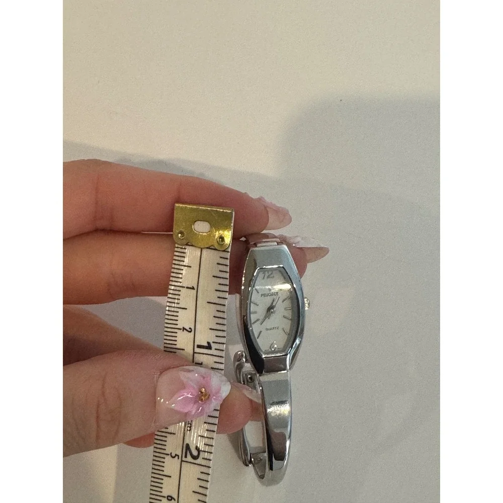 Peugeot Womens Silver Tone Bangle Watch Tonneau White Dial Quartz Timepiece